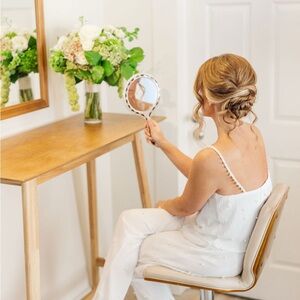 Elegant White Sleeveless Top and Pants Set